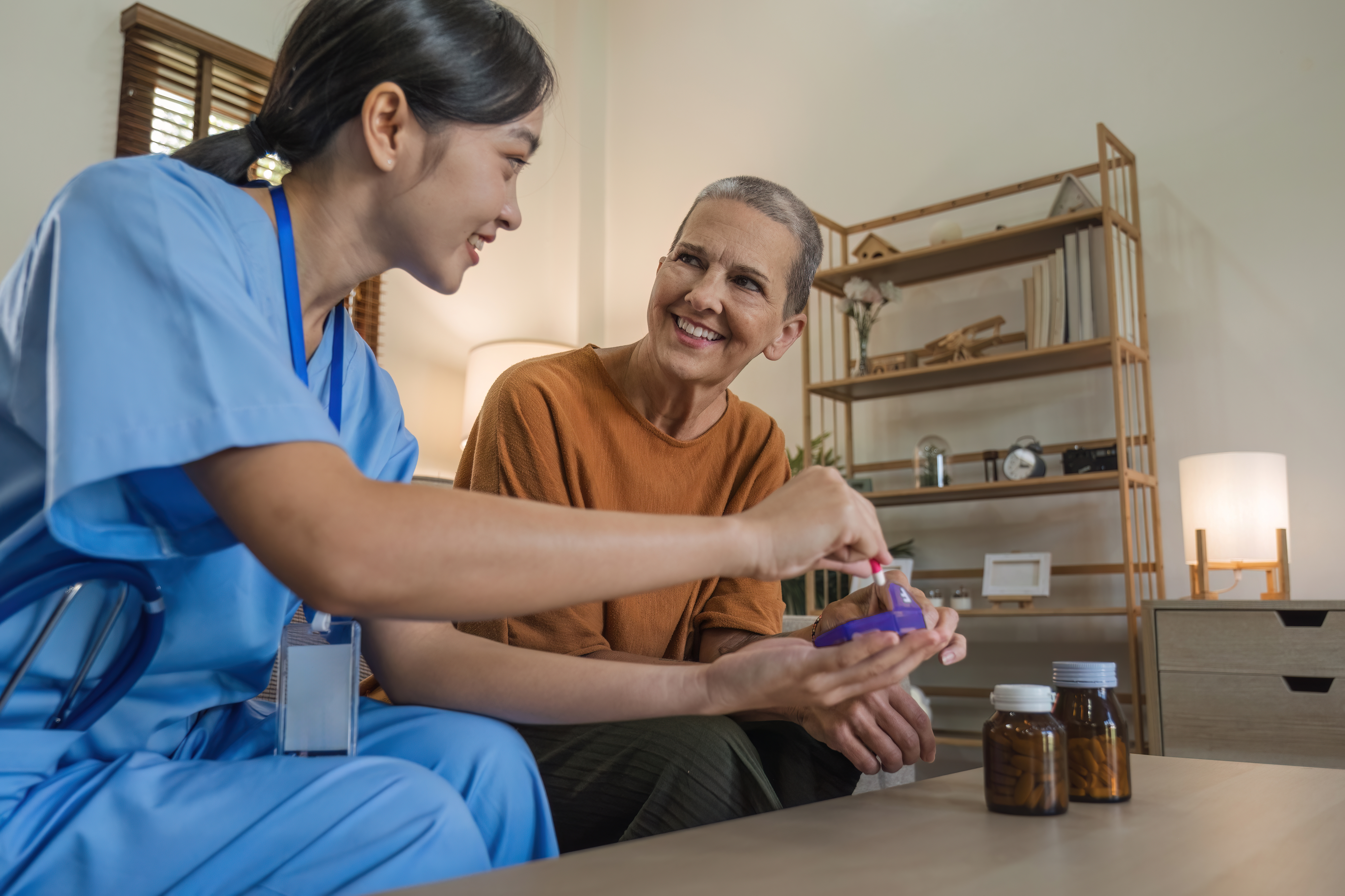 Young asian caregiver nurse giving consilt to a caucasian
